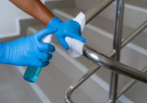 Woman Sanitizing Surfaces as Part of Janitorial Services for Pekin IL